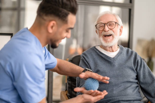 Speech therapist working with patient on language exercises